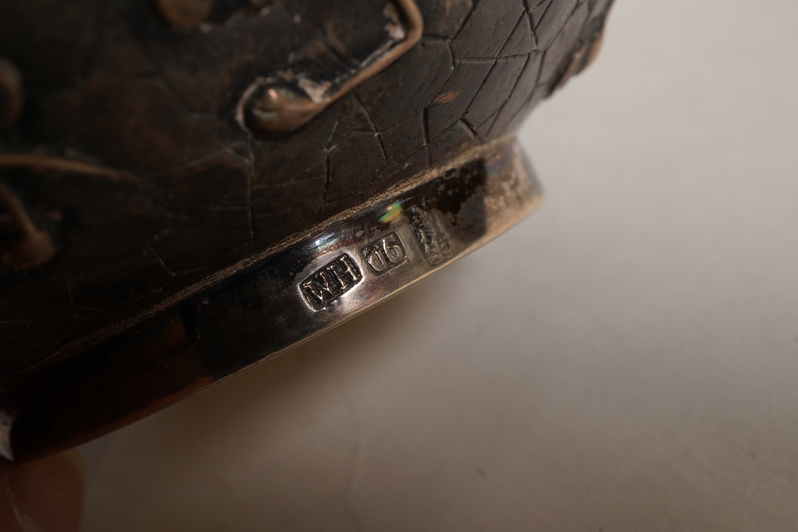 A pair of late 19th/early 20th century Chinese Export white metal two handled globular vases, by Wang Hing, Hong Kong